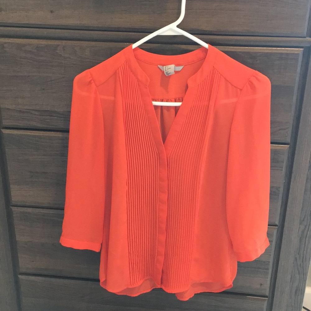 Sheer orange blouse